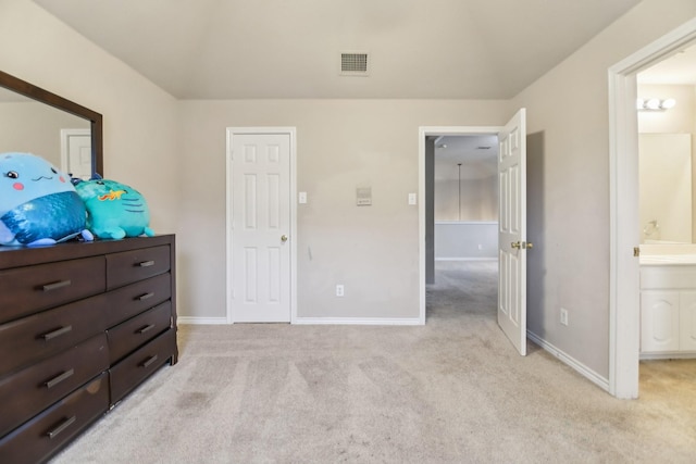 5221 Begonia Ct, Fort Worth, TX 76244 - bedroom featuring light colored carpet, baseboards, connected bathroom, and vaulted ceiling