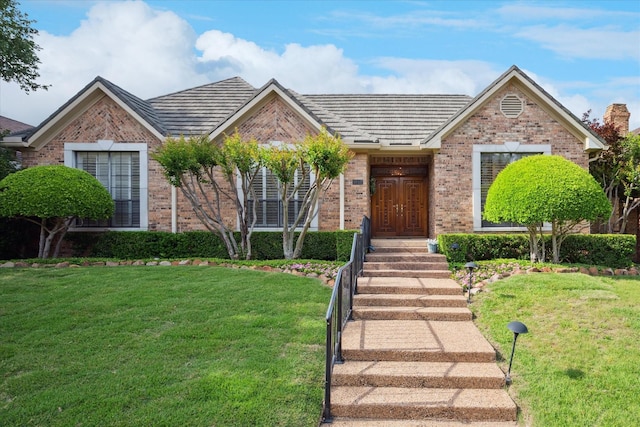 1817 Crockett Cir, Irving, TX 75038 - view of front of property with brick siding and a front yard