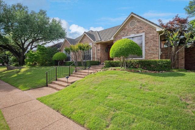 1817 Crockett Cir, Irving, TX 75038 - view of front of house with brick siding and a front lawn