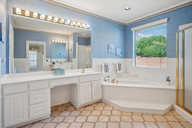 1817 Crockett Cir, Irving, TX 75038 - bathroom featuring crown molding, a shower stall, a bath, vanity, and wainscoting