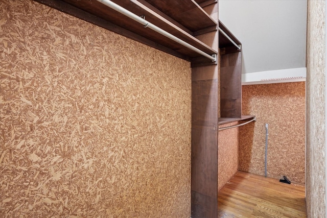 1817 Crockett Cir, Irving, TX 75038 - walk in closet featuring wood finished floors