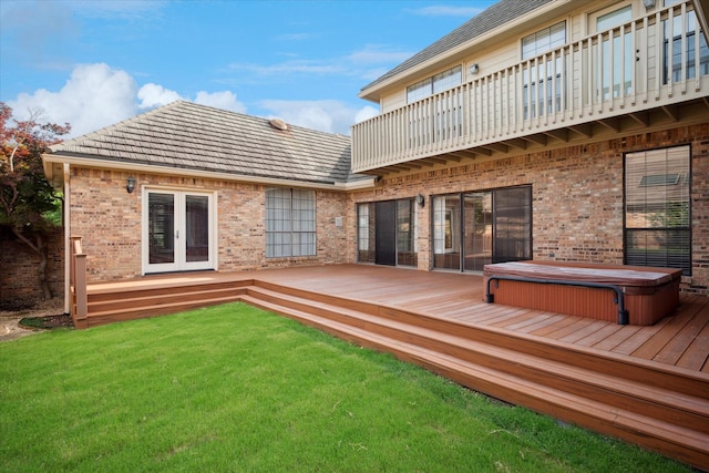 1817 Crockett Cir, Irving, TX 75038 - back of property with a covered hot tub, brick siding, a lawn, and a deck