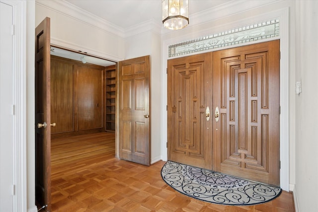 1817 Crockett Cir, Irving, TX 75038 - foyer with baseboards, a chandelier, and ornamental molding