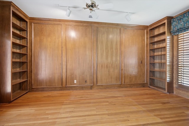 1817 Crockett Cir, Irving, TX 75038 - spare room with rail lighting and light wood-type flooring