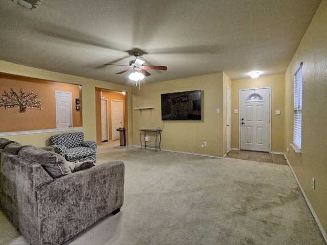 8614 Mountain Blf, Dallas, TX 75227 - living area featuring ceiling fan, carpet flooring, a textured ceiling, and baseboards