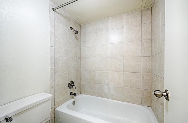 bathroom featuring toilet and shower / washtub combination