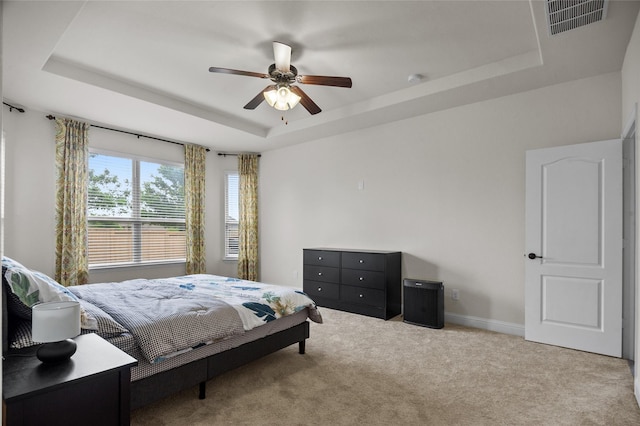 7500 W Fork Ln, Mckinney, TX 75071 - bedroom with a tray ceiling, carpet, baseboards, and ceiling fan