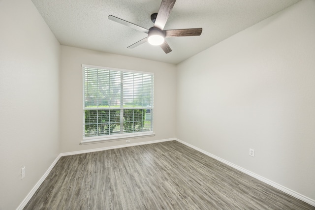 549 Seminole Trl, Murphy, TX 75094 - unfurnished room featuring wood finished floors, a textured ceiling, baseboards, and ceiling fan