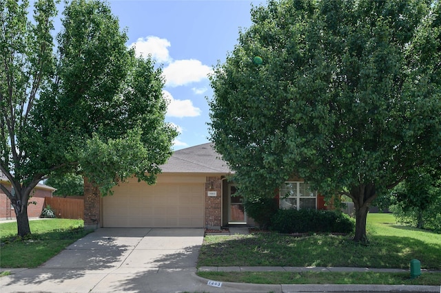 1443 Teal, Sherman, TX 75092 - obstructed view of property featuring an attached garage, driveway, and brick siding