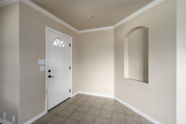 1443 Teal, Sherman, TX 75092 - entryway featuring light tile patterned flooring, crown molding, baseboards, and arched walkways