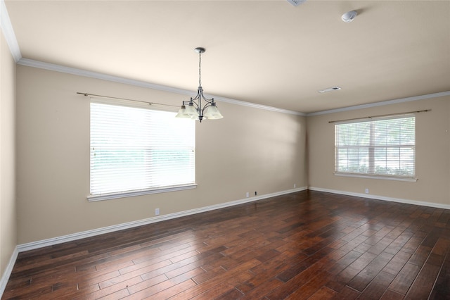 1443 Teal, Sherman, TX 75092 - empty room with a chandelier, dark wood finished floors, crown molding, and baseboards