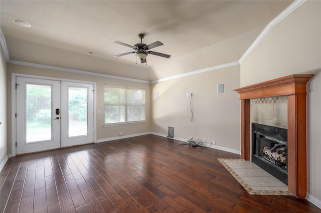 1443 Teal, Sherman, TX 75092 - unfurnished living room featuring french doors, dark wood-style flooring, plenty of natural light, and crown molding
