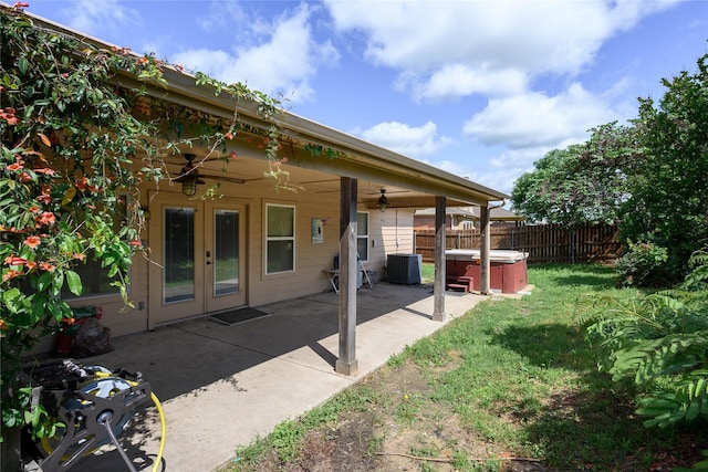 1443 Teal, Sherman, TX 75092 - back of property with a hot tub, french doors, ceiling fan, central air condition unit, and a patio