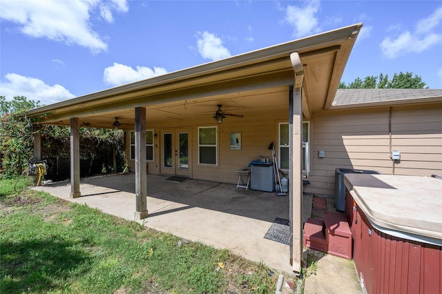 1443 Teal, Sherman, TX 75092 - back of house with a hot tub, ceiling fan, french doors, and a patio area