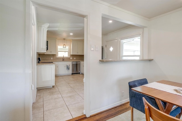 dining space featuring ornamental molding, baseboards, recessed lighting, and light tile patterned flooring