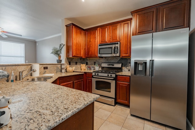 2131 Portofino Dr, Rockwall, TX 75032 - kitchen with appliances with stainless steel finishes, backsplash, crown molding, a sink, and light tile patterned floors