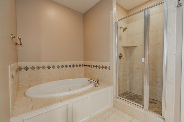 2131 Portofino Dr, Rockwall, TX 75032 - bathroom featuring a stall shower, a garden tub, and tile patterned floors