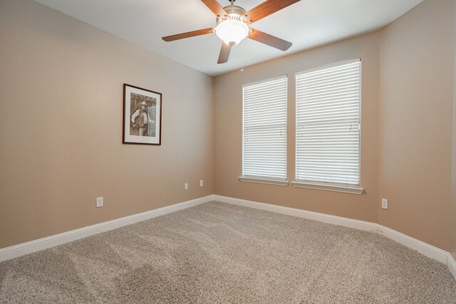 2131 Portofino Dr, Rockwall, TX 75032 - spare room with carpet floors, baseboards, and a ceiling fan