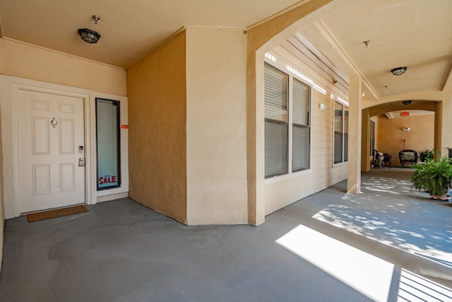 2131 Portofino Dr, Rockwall, TX 75032 - property entrance with a patio area and stucco siding