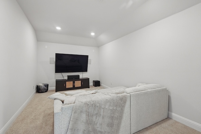 living room featuring carpet flooring, baseboards, and recessed lighting