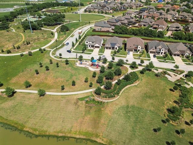 aerial overview of property's location with nearby suburban area and a large body of water