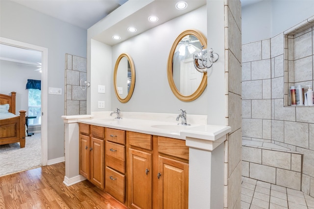 1811 Ashford Ln, Midlothian, TX 76065 - full bathroom with double vanity, wood finished floors, ensuite bath, recessed lighting, and baseboards