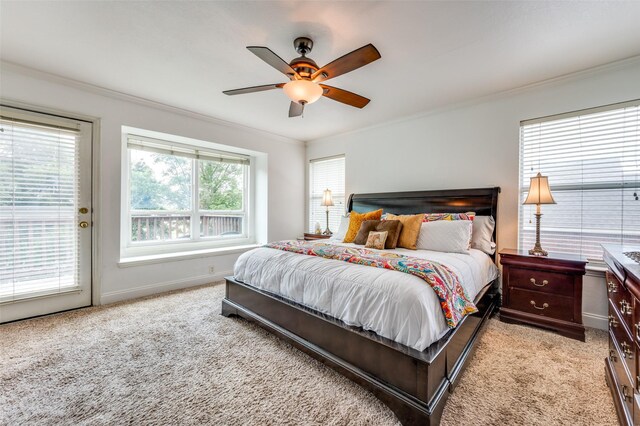 3625 Cottonwood Springs Dr, The Colony, TX 75056 - bedroom with ornamental molding, light carpet, access to exterior, baseboards, and ceiling fan