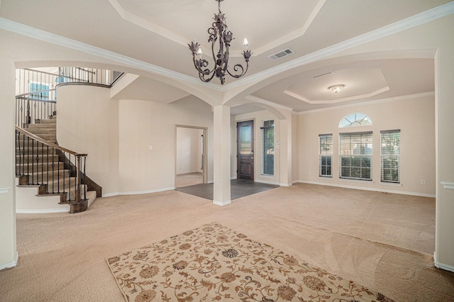 1432 Fence Post Dr, Fort Worth, TX 76052 - unfurnished living room with a raised ceiling, carpet floors, arched walkways, a chandelier, and crown molding