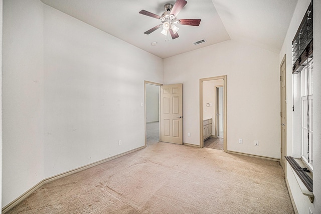 1432 Fence Post Dr, Fort Worth, TX 76052 - unfurnished bedroom featuring light carpet, vaulted ceiling, connected bathroom, baseboards, and a ceiling fan