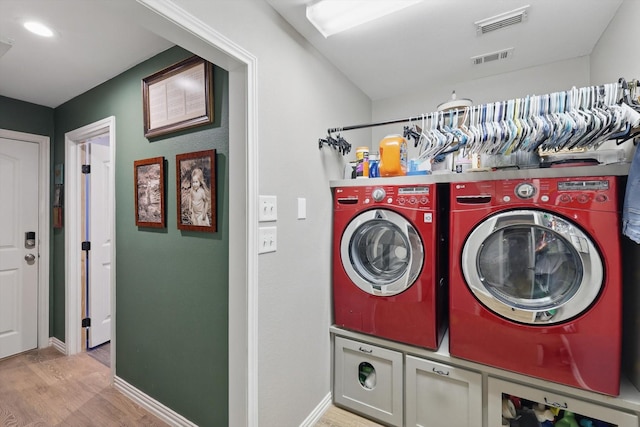 104 Radecke Rd, Krum, TX 76249 - laundry area with separate washer and dryer, light wood finished floors, and baseboards
