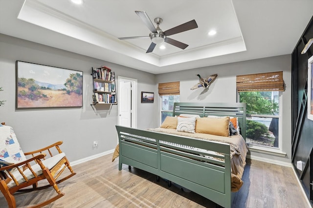 104 Radecke Rd, Krum, TX 76249 - bedroom with a raised ceiling, light wood-type flooring, baseboards, recessed lighting, and crown molding