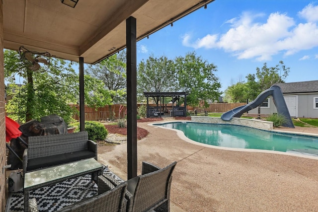 104 Radecke Rd, Krum, TX 76249 - view of pool featuring a water slide, a fenced backyard, and a patio