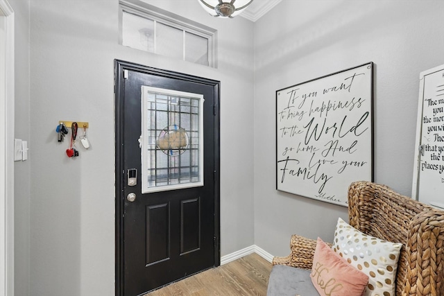 104 Radecke Rd, Krum, TX 76249 - foyer with crown molding, wood finished floors, and baseboards