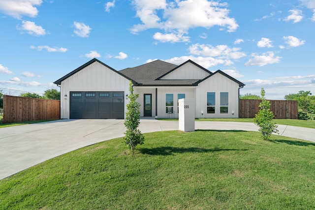 205 Altamesa Blvd, Fort Worth, TX 76134 - modern farmhouse style home with board and batten siding, concrete driveway, a garage, and a shingled roof