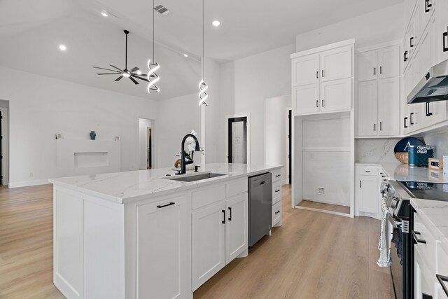 205 Altamesa Blvd, Fort Worth, TX 76134 - kitchen featuring appliances with stainless steel finishes, a sink, light stone countertops, a kitchen island with sink, and recessed lighting