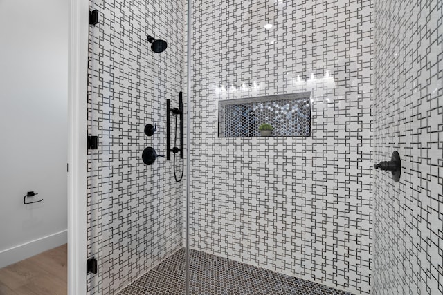 205 Altamesa Blvd, Fort Worth, TX 76134 - bathroom with a shower stall and wood finished floors