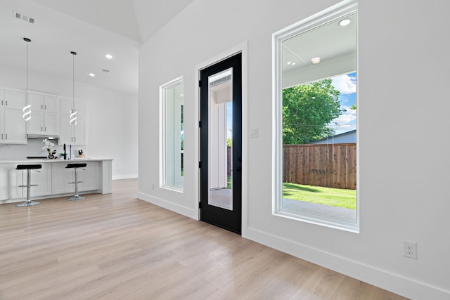 205 Altamesa Blvd, Fort Worth, TX 76134 - entryway with light wood-style floors, baseboards, and recessed lighting