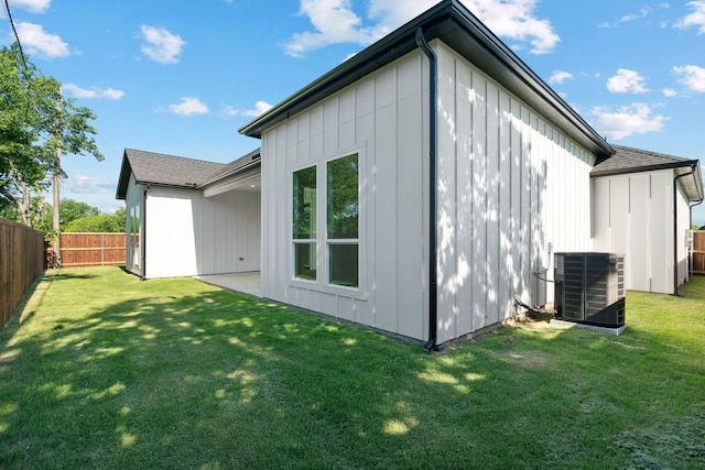 205 Altamesa Blvd, Fort Worth, TX 76134 - back of property featuring central air condition unit and board and batten siding