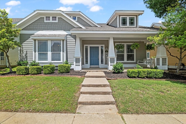 1505 Oakcrest Dr, Providence Village, TX 76227 - view of front of property with a front lawn, a porch, and a shingled roof