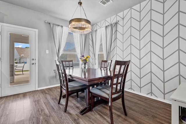 1505 Oakcrest Dr, Providence Village, TX 76227 - dining space featuring dark wood-type flooring and baseboards