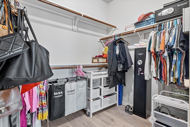 1505 Oakcrest Dr, Providence Village, TX 76227 - spacious closet featuring wood finished floors