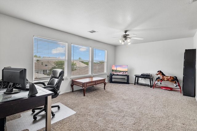 1505 Oakcrest Dr, Providence Village, TX 76227 - carpeted office space featuring a ceiling fan, a textured ceiling, and baseboards
