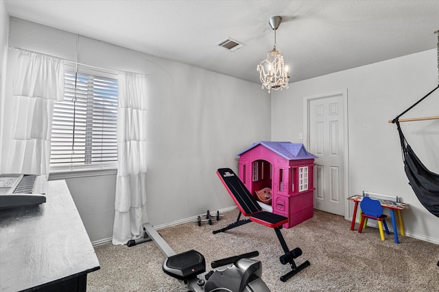 1505 Oakcrest Dr, Providence Village, TX 76227 - exercise area featuring a chandelier, carpet, and baseboards