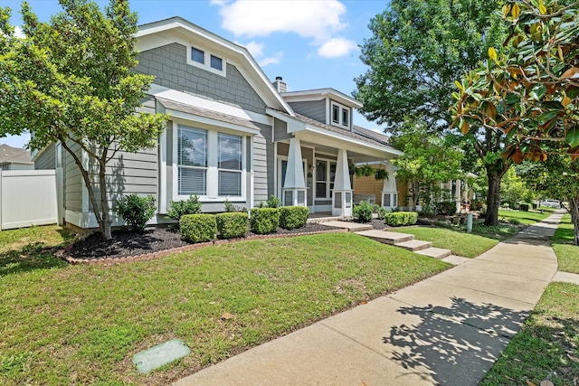 1505 Oakcrest Dr, Providence Village, TX 76227 - view of front facade featuring a porch and a chimney