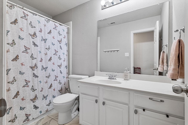 1505 Oakcrest Dr, Providence Village, TX 76227 - full bath with toilet, vanity, marble look tile flooring, and a shower with curtain