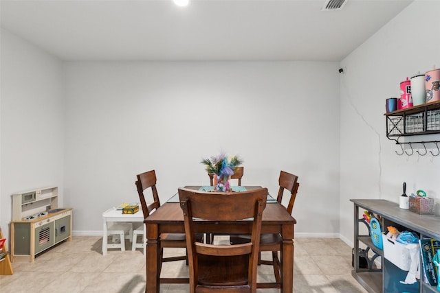 16417 Marinette Ct, Justin, TX 76247 - dining area featuring light tile patterned flooring and baseboards