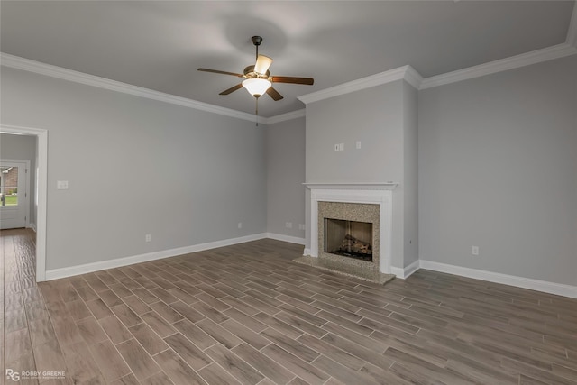 345 Coppice Pl, Bossier City, LA 71111 - unfurnished living room featuring ceiling fan, wood finished floors, crown molding, baseboards, and a premium fireplace