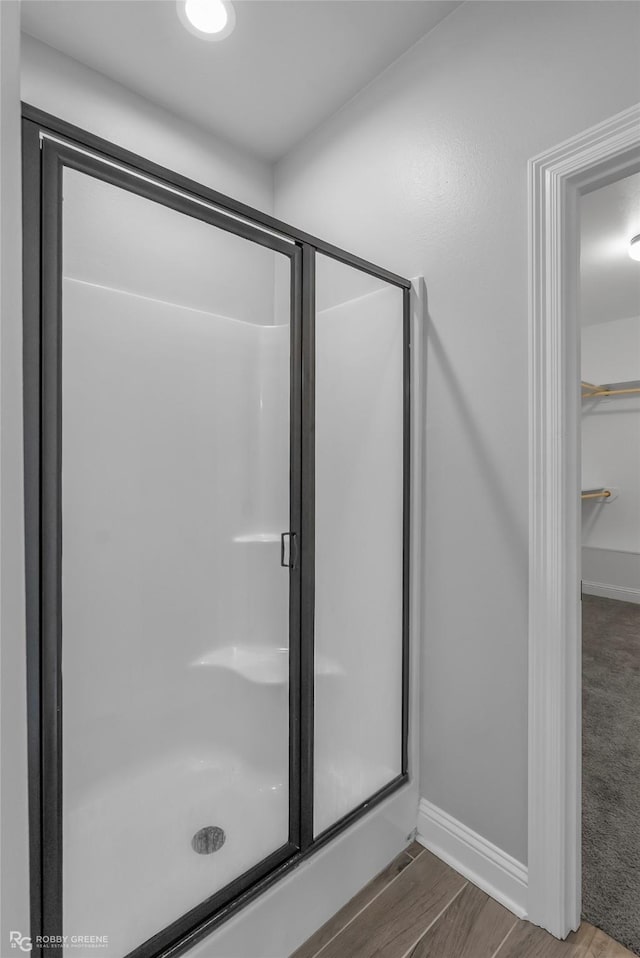 345 Coppice Pl, Bossier City, LA 71111 - full bathroom featuring a shower stall, wood finished floors, and baseboards