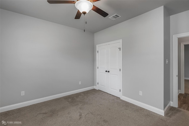 345 Coppice Pl, Bossier City, LA 71111 - unfurnished bedroom with carpet, baseboards, a ceiling fan, and a closet