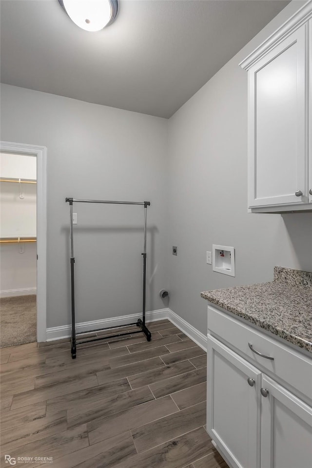 345 Coppice Pl, Bossier City, LA 71111 - laundry area with hookup for a washing machine, dark wood-style flooring, baseboards, and hookup for an electric dryer